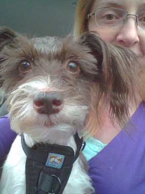 Image of Pixel Blue Eyes with her Mommy in Background inside Car